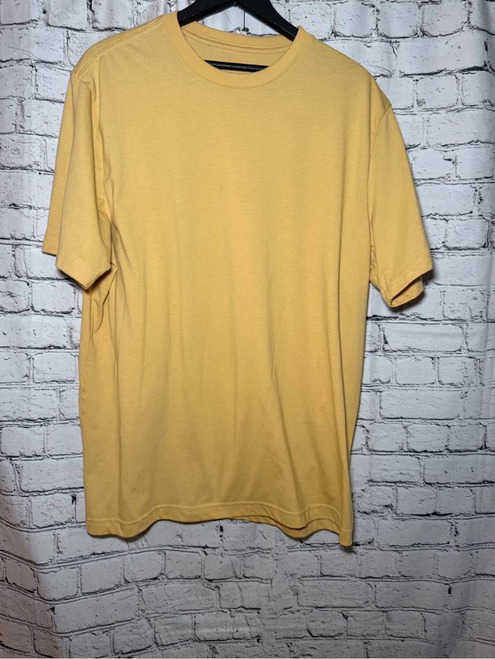 George. Yellow tshirt. Size XL